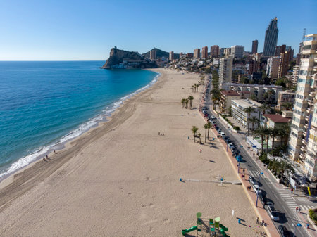 Aerial photo taken in Benidorm in Spain Alicante, showing the beautiful beach of Playa Levante and hotels, buildings, and high rise skyline cityscape.の写真素材