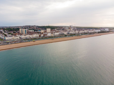 Aerial photo of the Brighton beach and coastal area located in the south coast of England UK that is part of the City of Brighton and Hove, taken on a bright sunny dayの写真素材