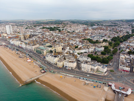 Aerial photo of the Brighton beach and coastal area located in the south coast of England UK that is part of the City of Brighton and Hove, taken on a bright sunny dayの写真素材
