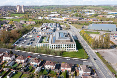 Aerial drone photo of the Police headquarters the city of Leeds west Yorkshire in the UK, showing the new Police building from above in the summer time on a hot sunny dayの写真素材