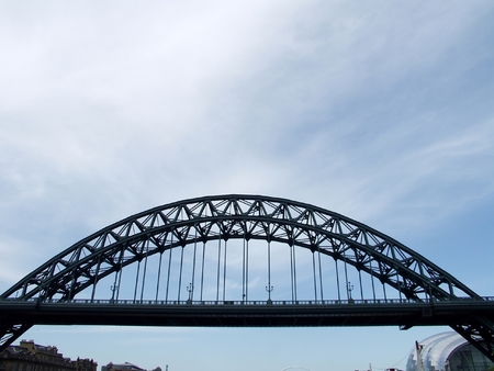 Tyne Bridge famous landmark in Newcastle upon Tyne with  sage gateshead on the backgroundの写真素材