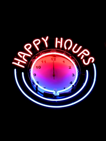 Happy hours clock in nightbarの写真素材