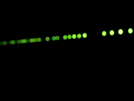 Unfocused public lamps on blackの写真素材