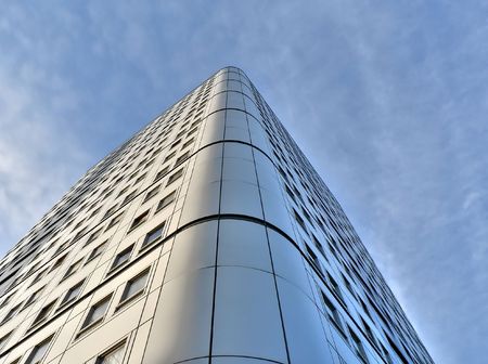 Offices building with blue sky and thin clouds