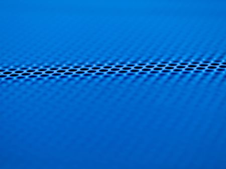 Macro picture of a metallic grid blue tintedの写真素材