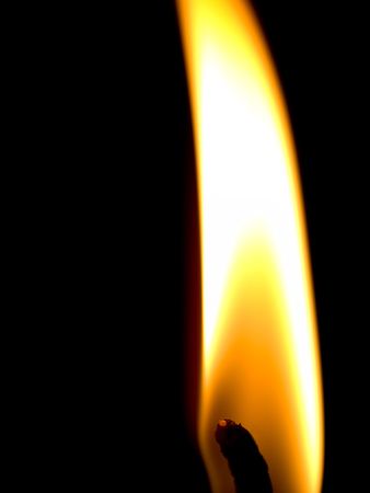 Votive candle burning in the Shrine of Lourdes