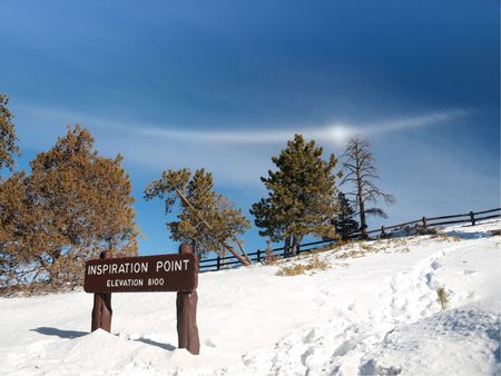 Entrance of Bryce canyon inspiration point with an unusual cloud formationの写真素材