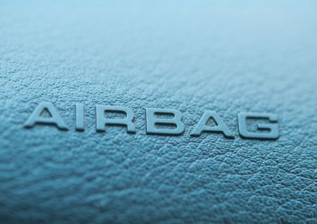 macro of an airbag sign on a dashboardの写真素材