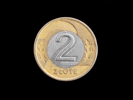A two zloty polish coin isolated on blackの写真素材