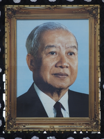 Phnom Penh - November 10   Big portrait  of former king of Cambodia  Norodom Sihanouk  hang on the front of the Royal Palace  in Phnom Phen Cambodia on November 10 2012のeditorial素材
