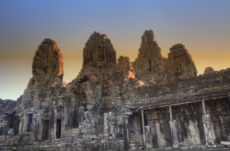 Bayon temple at sunset in Angkor Cambodiaの写真素材