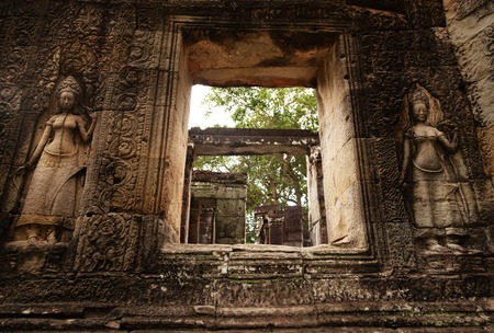 Devatas at Banteay Kdei temple in Angkorの写真素材
