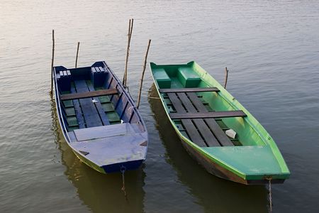 a pair of  boats at dock の写真素材