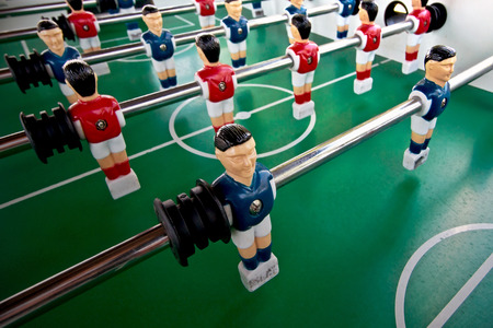 Miniature figures of  players fixed on rods .の写真素材