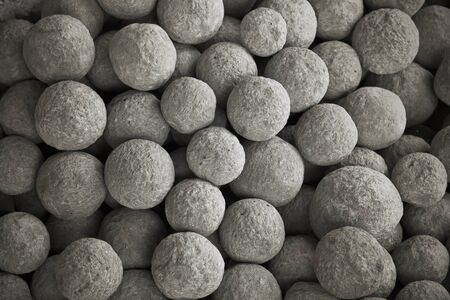 Collection of  ancient stone cannon balls