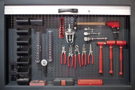 Professional tool set for car reapair. Workshop tool wall.