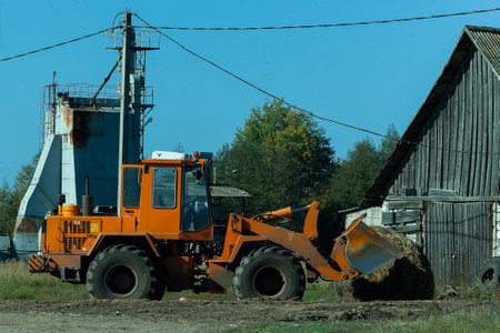 Bulldozer, a huge orange powerful construction machine