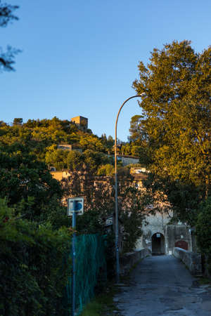View at sunrise on houses on the mountainside in Sauve (Occitanie, France)