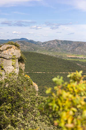 View of Mont Saint-Baudille from the Roc des Deux Vierges hiking trail in Saint-Saturnin-de-Lucian (Occitanie, France)の写真素材