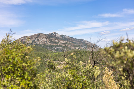 View of Mont Saint-Baudille from the Roc des Deux Vierges hiking trail in Saint-Saturnin-de-Lucian (Occitanie, France)の写真素材
