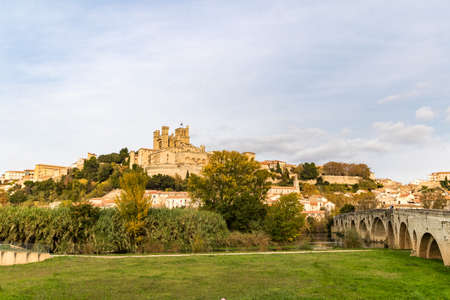 View from the banks of the Orb River on the Saint-Nazaire cathedral in BÃ©ziers (Occitanie, France)のeditorial素材