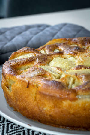 Apple pie on the table, close-up, selective focus.