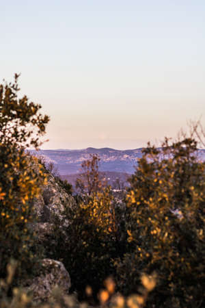 View of the mountains from the top of the mountain at sunset.の写真素材