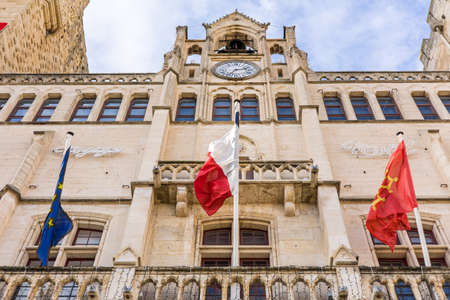 Spanish flag on the facade of the City Hall of Sevilleの写真素材