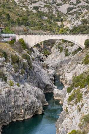View of the HÃ©rault Gorges from the Devil's Bridge on a cloudy day (Occitanie, France)の写真素材