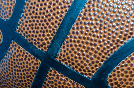 Close up of the texture of a basketball.  Could be used as a background.の写真素材