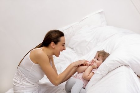 Family at home in bedroomの写真素材