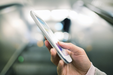 Female smartphone hand underground message sms e-mail