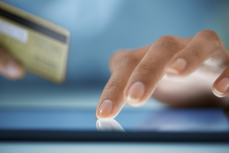 Close-up hand Woman shopping online with digital tablet