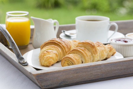 French breakfast with croissants,coffee and orange juiceの写真素材