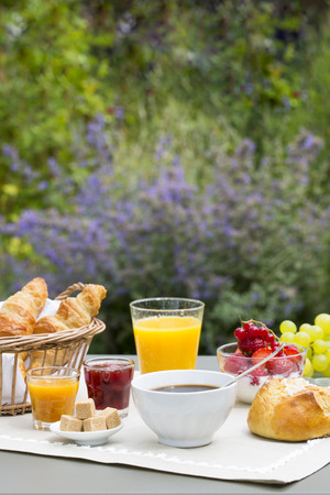 Sunny breakfast in gardenの写真素材
