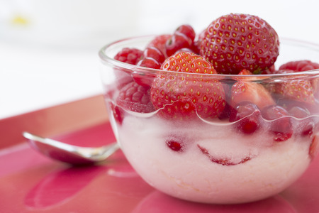 Red fruits in bowl glassの写真素材