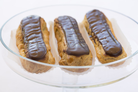 Delicious French Chocolate eclairs on plate