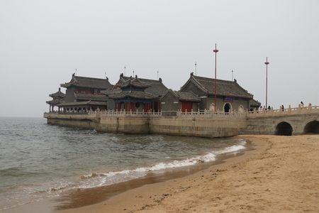 Landscape view of a traditional building on the waterのeditorial素材