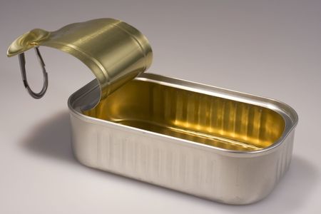 Closeup of an open sardine can; the can is clean and the lid is upの写真素材