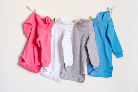 Multi-colored body with long sleeves hang on a ropeの写真素材