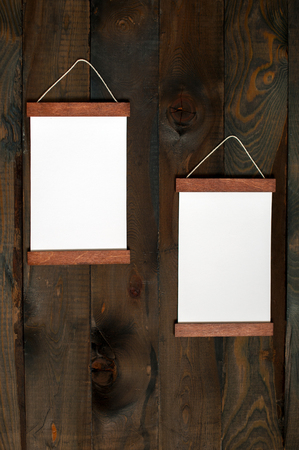 Two frames on a dark wooden backgroundの写真素材