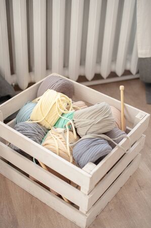 Knitting threads in a box