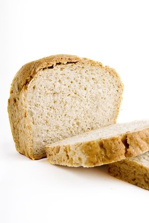 A single slice of homemade bread on a white background.の写真素材