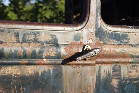 A texture background image of an old rusting car.の写真素材