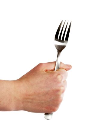 A fork being held by a womans hand.の写真素材