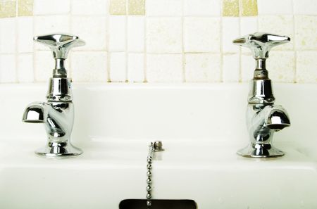 A retro bathroom sink tap.