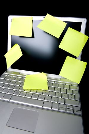 A sticky note on a laptop computer - remember thisの写真素材
