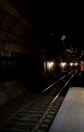 A train tunnel into the darkness