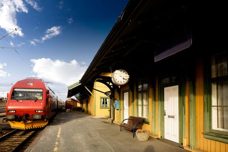 An old train station against a deep blue skyの写真素材