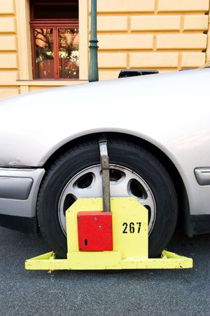 A wheel block 'parking ticket' in Prague, Czech Republic.の写真素材